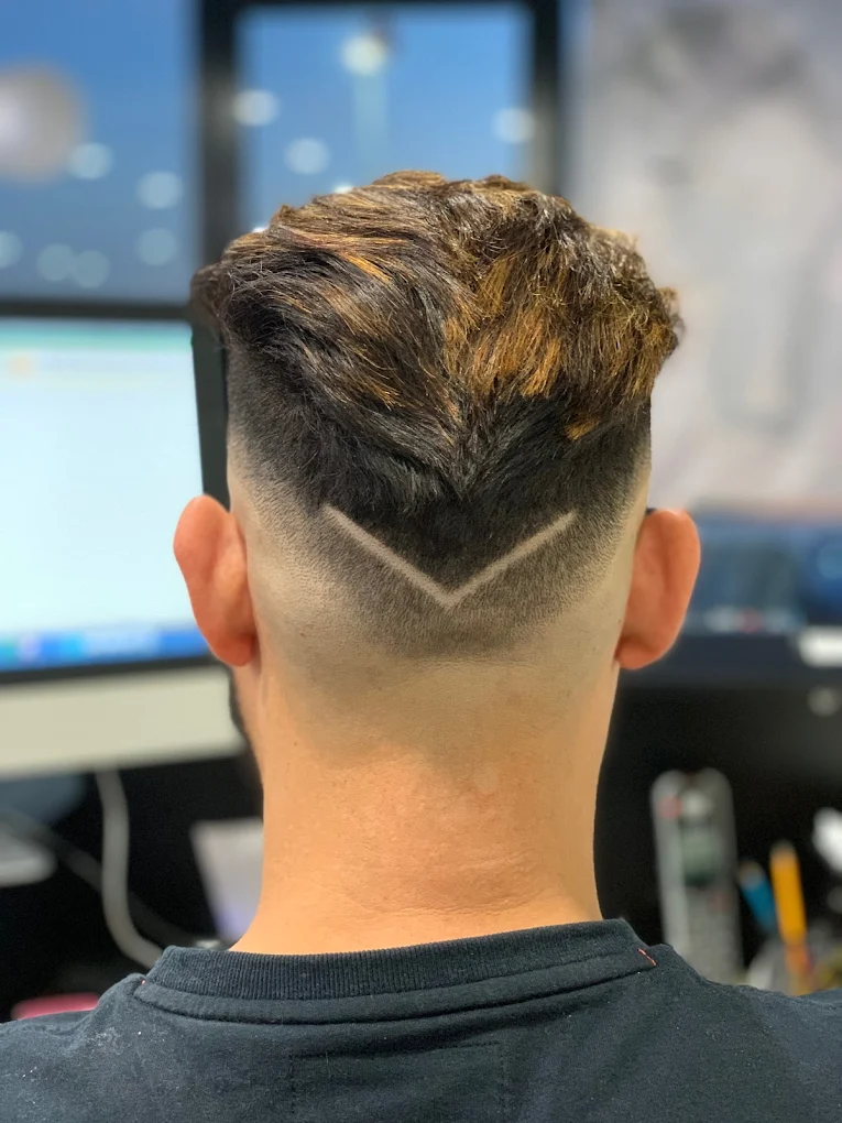 Men's fade with V design